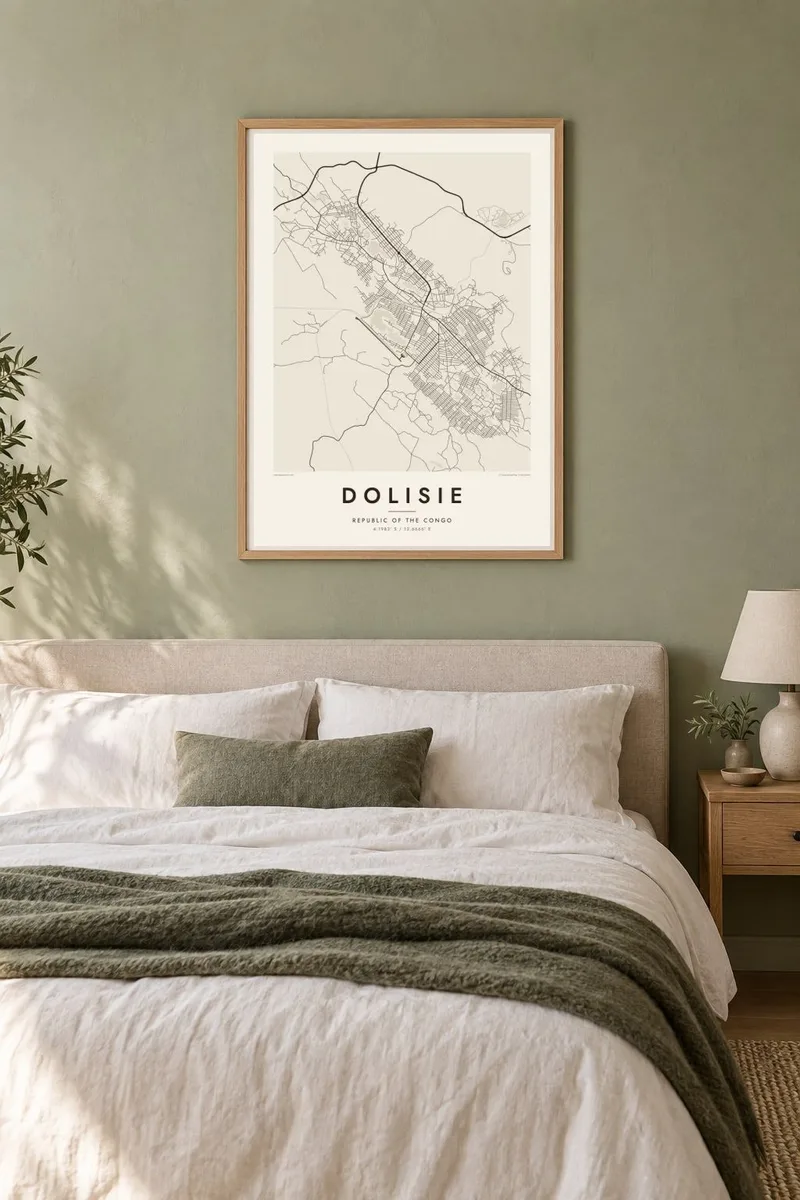 Dolisie map poster in an oak frame, sage bedroom interior