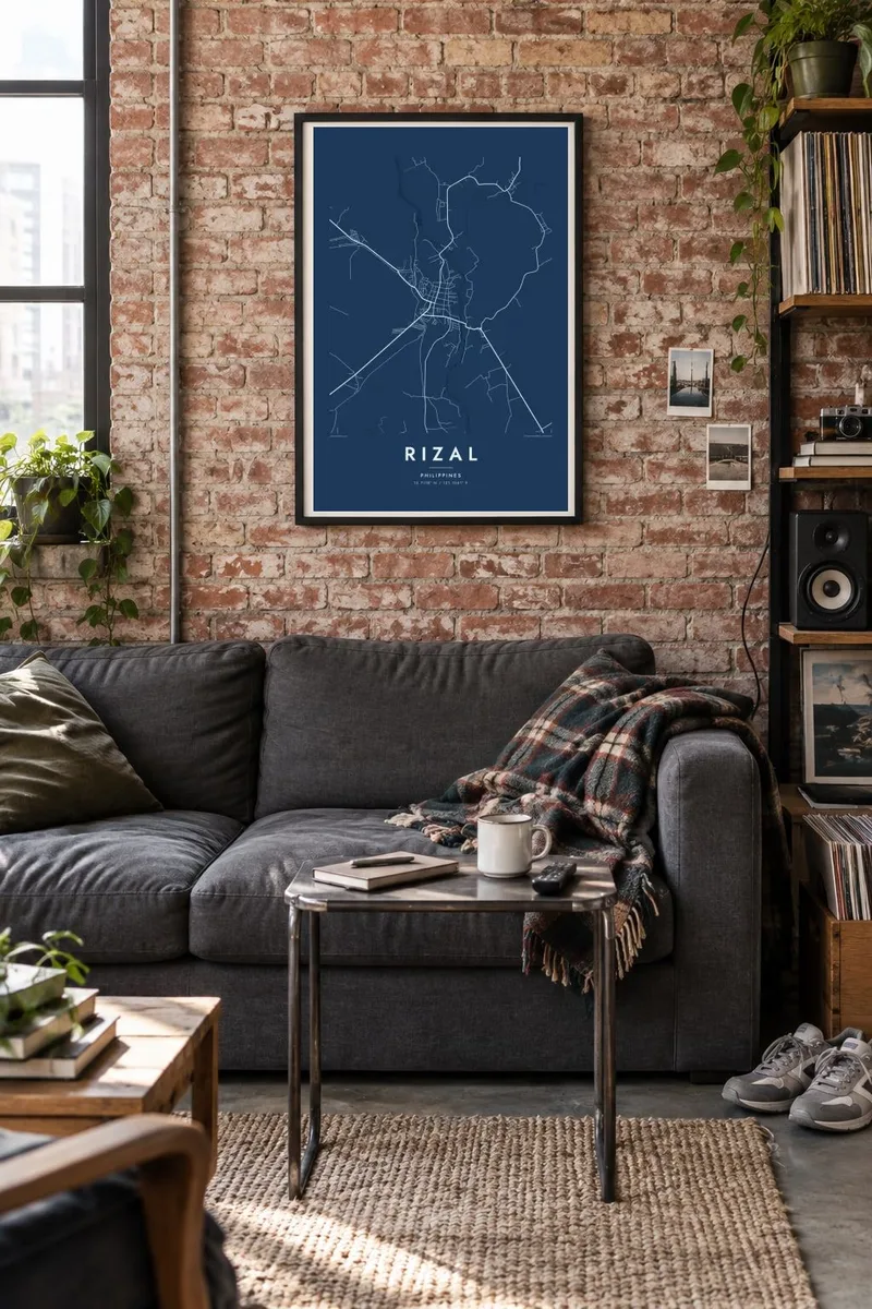 Rizal map poster in a black frame, brick loft interior