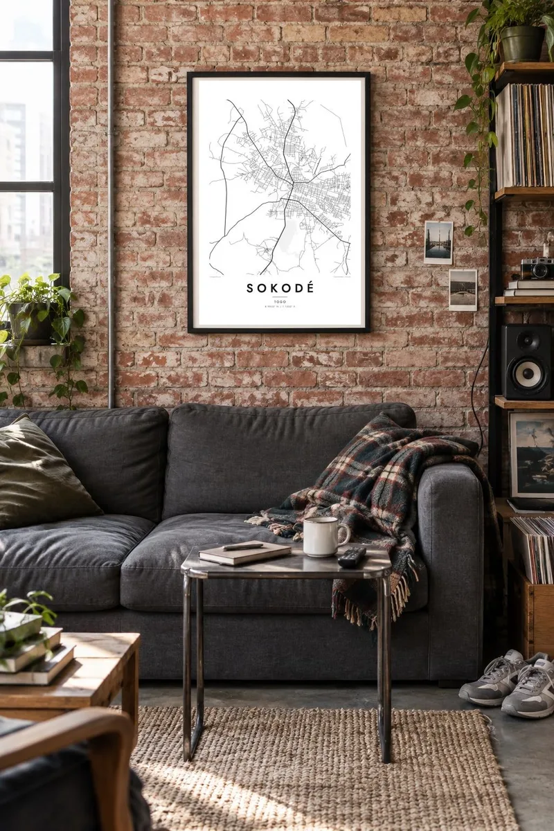 Sokodé map poster in a black frame, brick loft interior